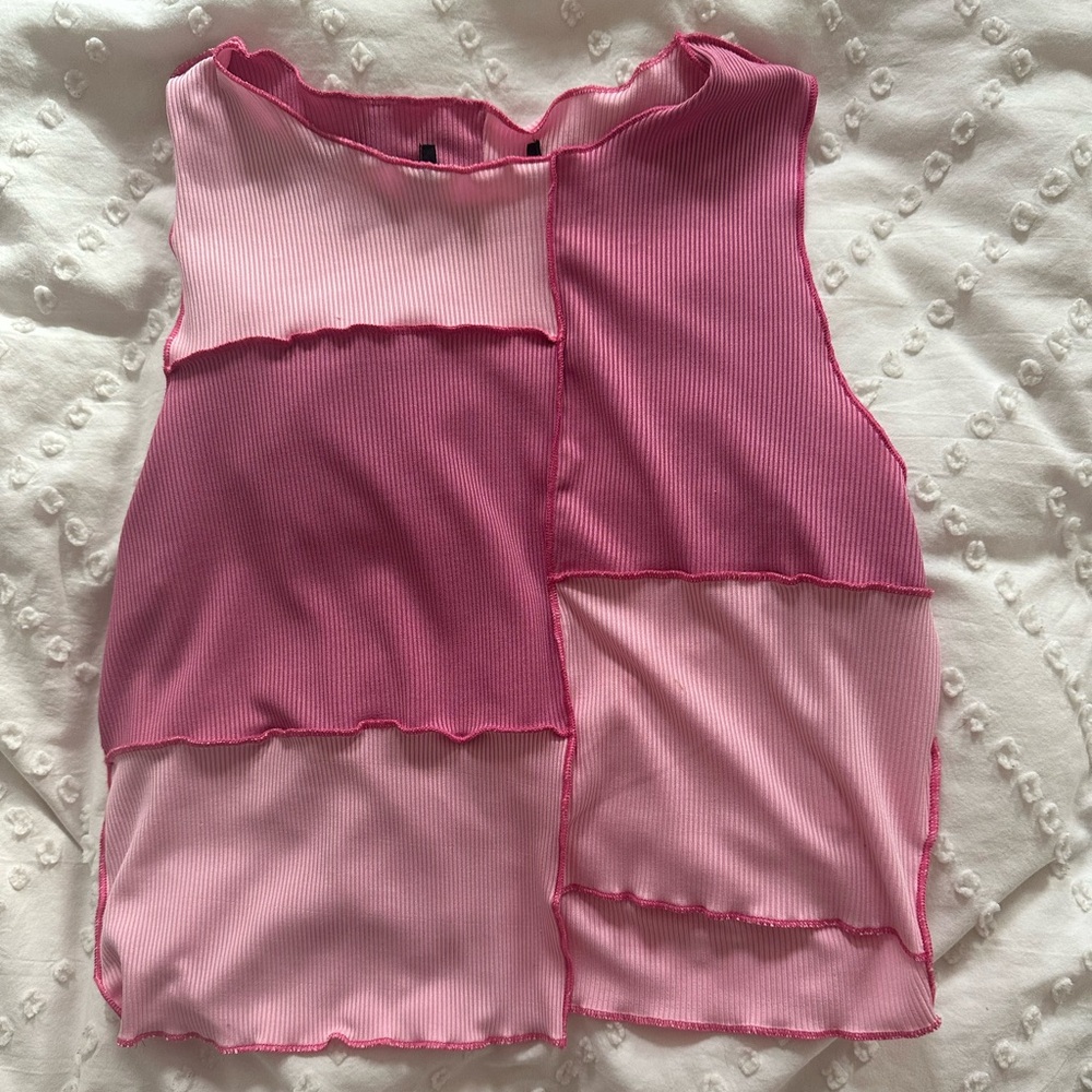 small pink asymmetrical going out top